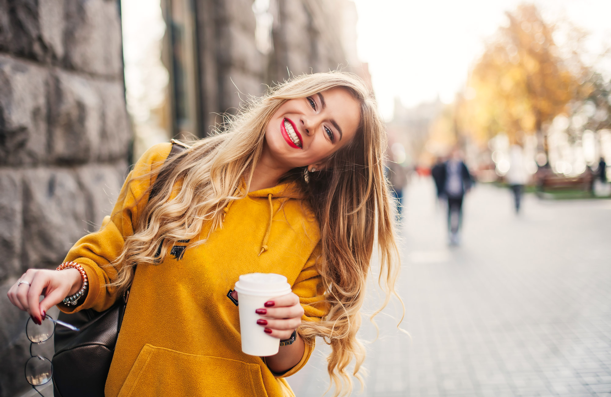 girl-coffee-yellow-jumper