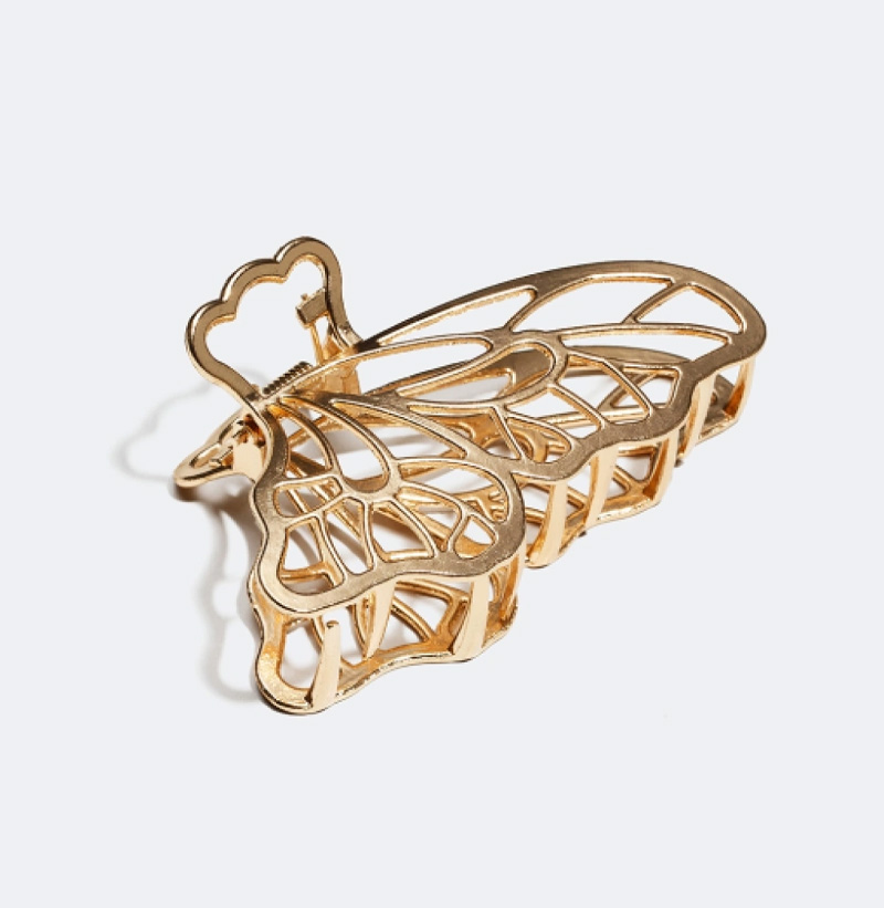 håraccessoarer guld